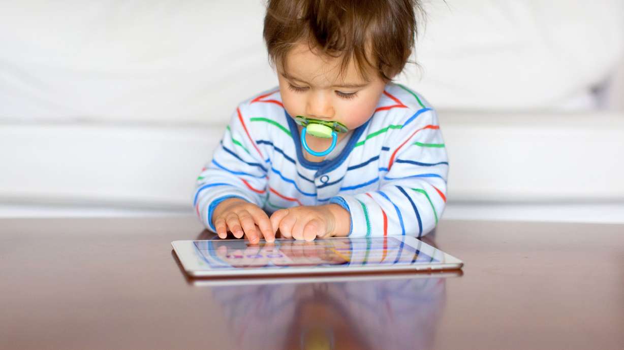 Screen time at age 1 has been linked with developmental delays in toddlerhood, a study suggests.