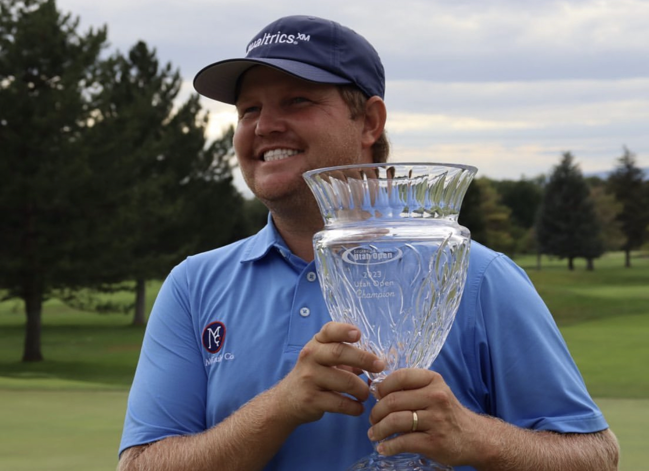 Former BYU golfer Zac Blair holds the trophy after winning the Siegfried and Jensen Utah Open, Saturday, Aug. 19, 2023, at Riverside Country Club in Provo.