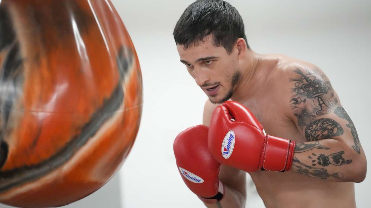 Biaggio Ali Walsh hits a punching bag while training ahead of his return to the Professional Fighters League, Monday, July 24, 2023, in New York. Ali Walsh can't wait to fight, and gets the next chance in his young MMA career Wednesday on a PFL card at Madison Square Garden, where his grandfather participated in some major events.