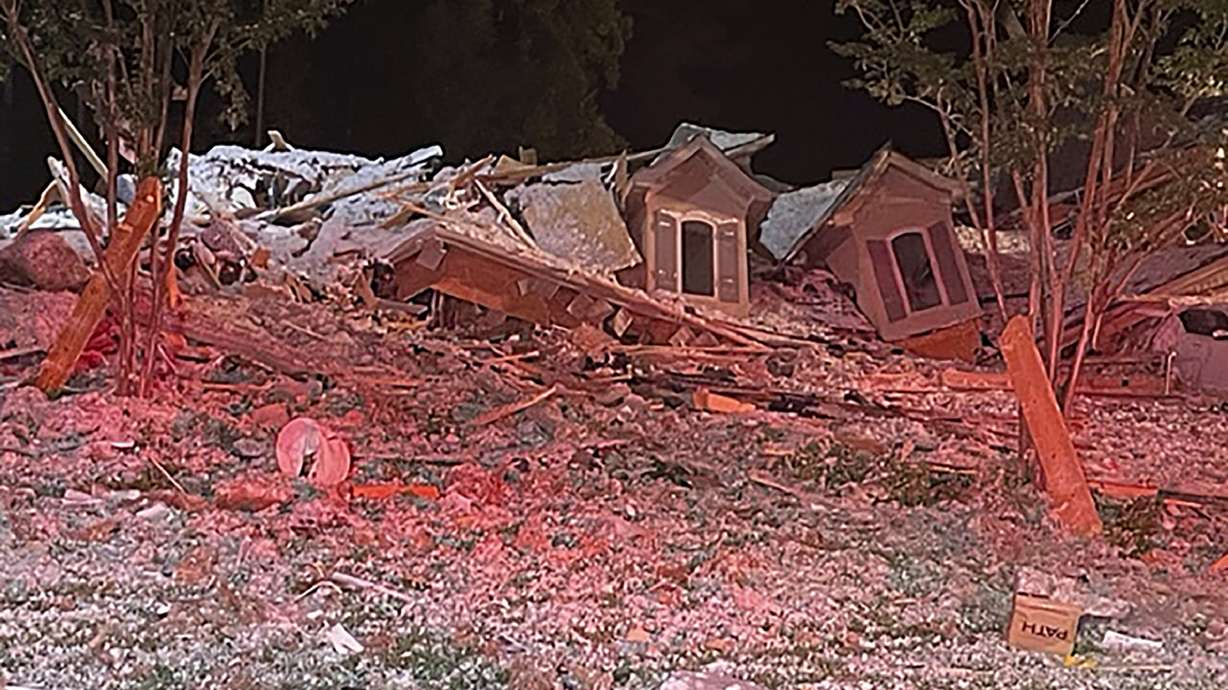 This photo provided by the Iredell County Fire Services and Emergency Management taken early Tuesday morning, Aug. 22, 2023, in Mooresville, N.C., shows the rubble of a home that collapsed. Iredell County Emergency Management said in a Tuesday news release that emergency officials responded to the home after a reported explosion and collapse and that one person was injured and another person was found dead in the debris.