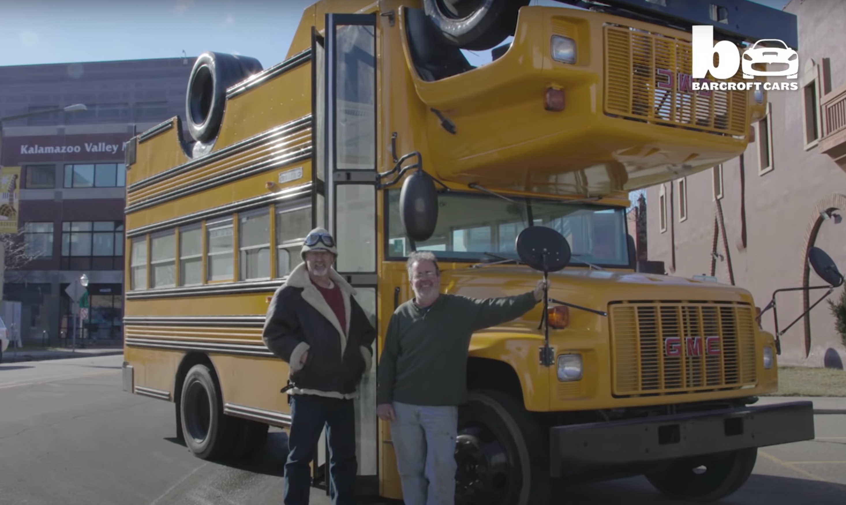 Two mechanics faced tricky problem from a client: Fit two school buses into one parking space. 