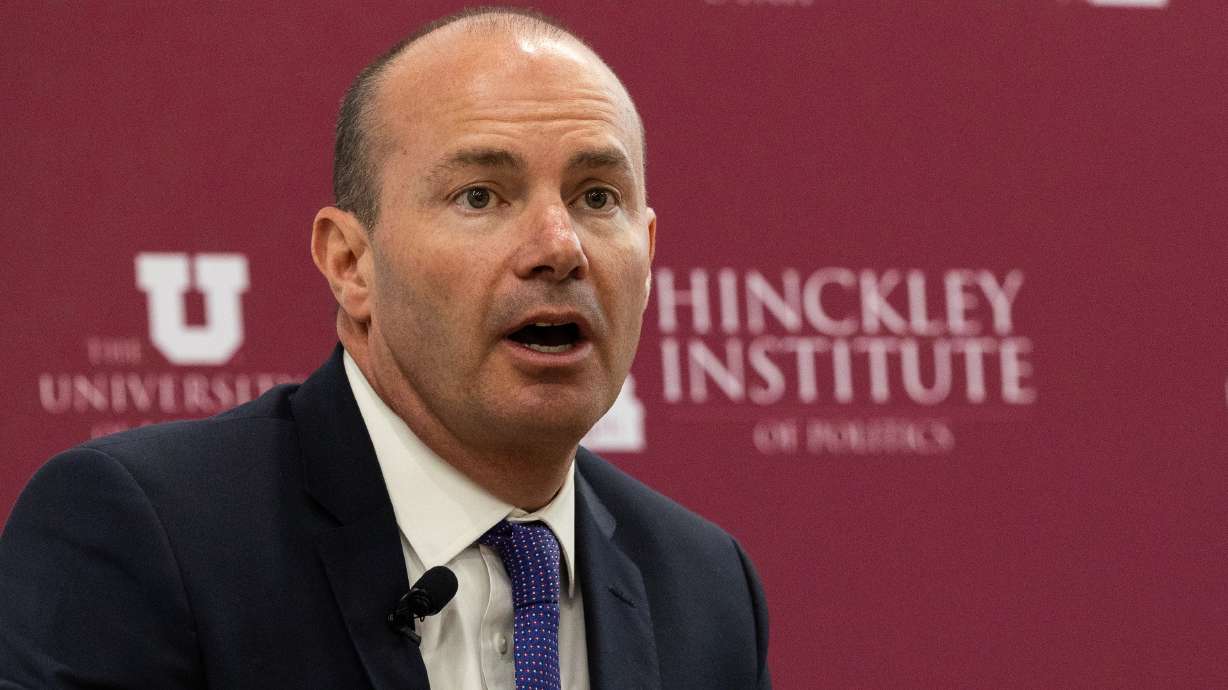 Utah Sen. Mike Lee speaks at the Hinckley Institute on the University of Utah campus in Salt Lake City on Aug. 22. Lee told Fox News there's "no reason" the impeachment inquiry into President Joe Biden can't continue if the government shuts down.