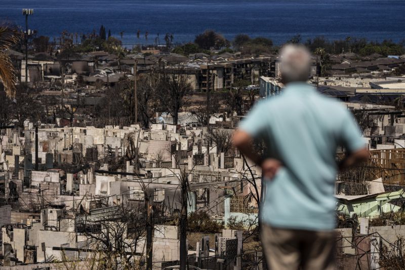 A man views the aftermath of a wildfire in Lahaina, Hawaii, Aug. 19.
