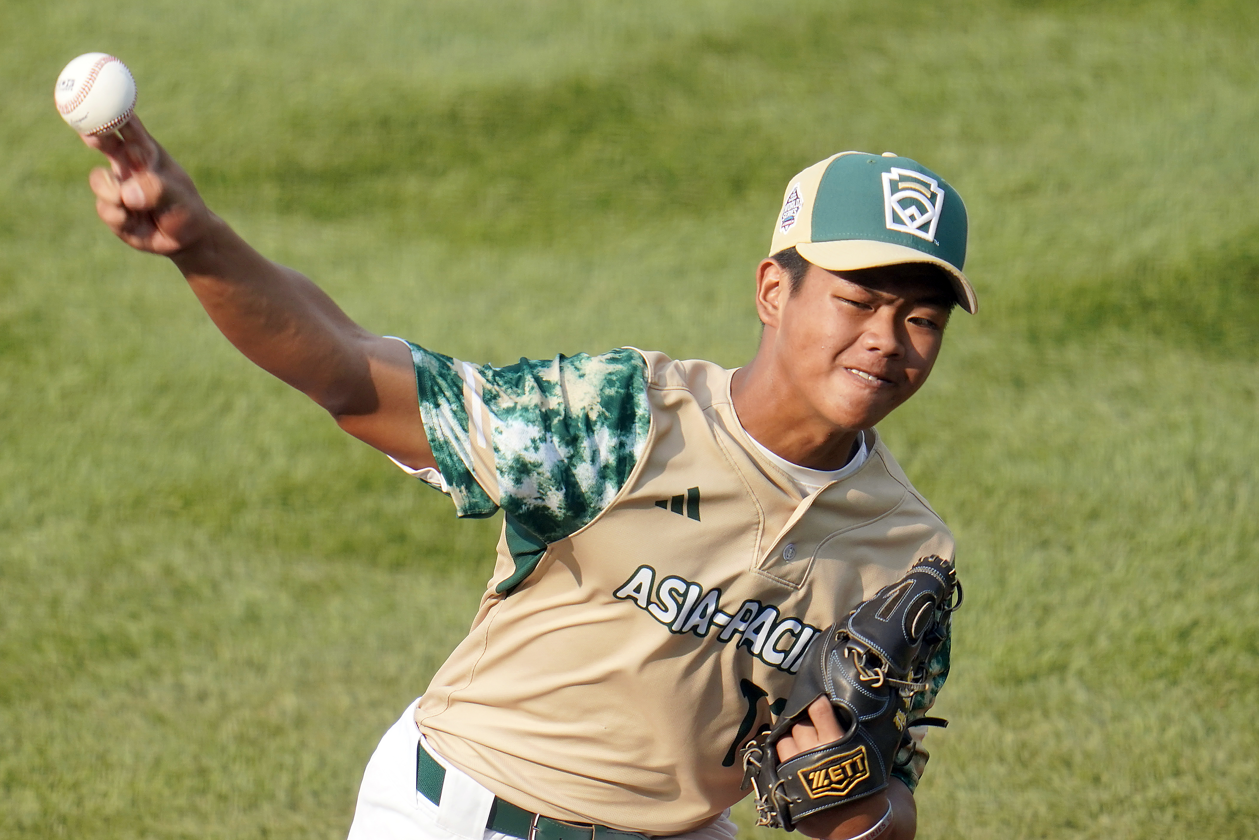 Taiwan starting pitcher Fan Chen-Jun delivers against Japan during the first inning of a baseball game at the Little League World Series tournament in South Williamsport, Pa., Monday, Aug. 21, 2023. 