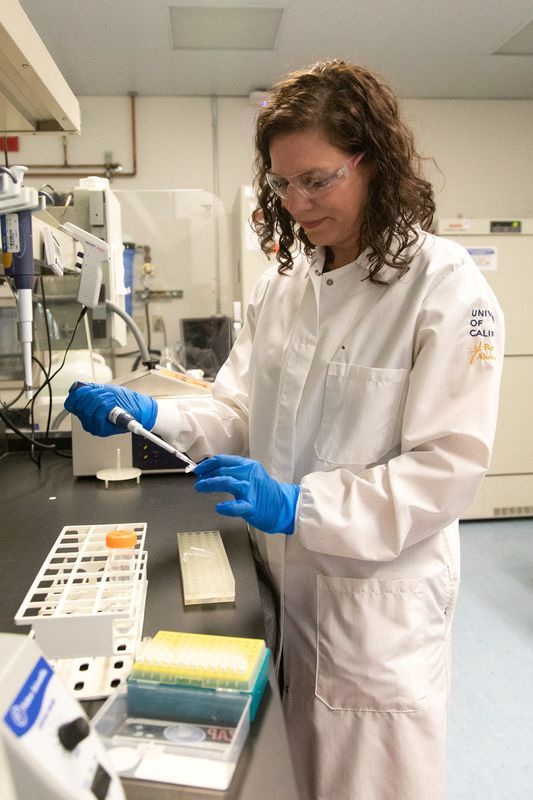 Geneticist Karen Miga is seen at a laboratory, used in research involving the human Y chromosome, at the University of California, in Santa Cruz, Calif., Feb. 10, 2022.