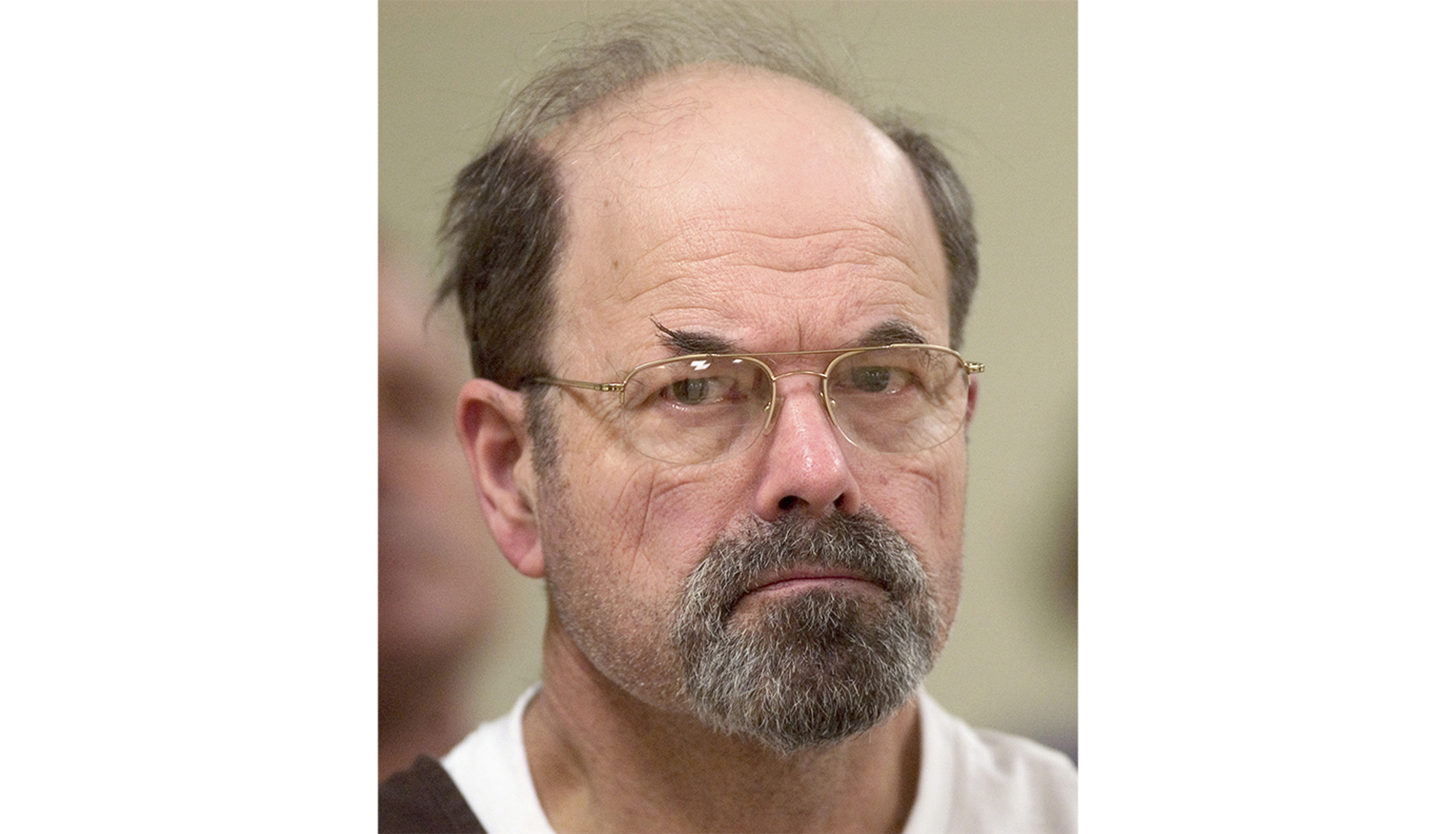 Convicted BTK killer Dennis Rader listens during a court proceeding, Oct. 12, 2005. On Wednesday authorities in Oklahoma and Missouri said they are investigating whether the BTK serial killer was responsible for other homicides.