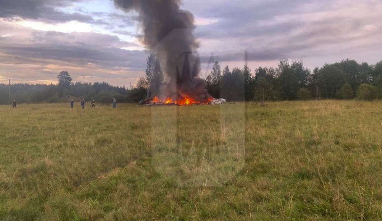 This image released by Ostorozhno Novosti on Wednesday, shows the crash site of a private jet near the village of Kuzhenkino, Tver Region. Officials say a private jet has crashed over Russia, killing all 10 people on board, including mercenary chief Yevgeny Prigozhin.