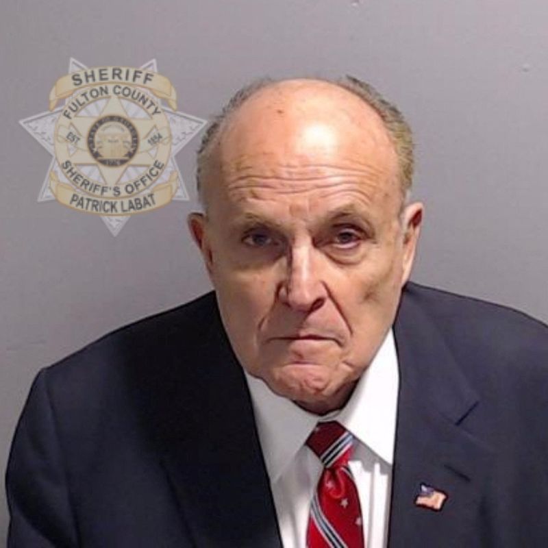 Rudy Giuliani, who served as former U.S. Donald Trump's personal lawyer, is shown in a police booking mug shot released by the Fulton County Sheriff's Office in Atlanta on Wednesday.