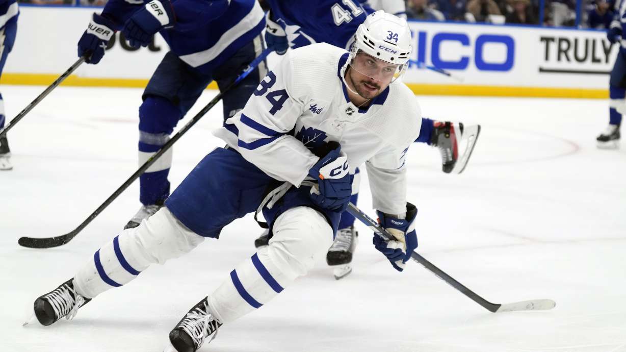 FILE - Toronto Maple Leafs center Auston Matthews (34) reacts after scoring against the Tampa Bay Lightning during the third period in Game 4 of an NHL hockey Stanley Cup first-round playoff series on April 24, 2023, in Tampa, Fla. The Maple Leafs signed star center Matthews to a four-year deal, $53 million contract extension on Wednesday, Aug. 23, 2023.