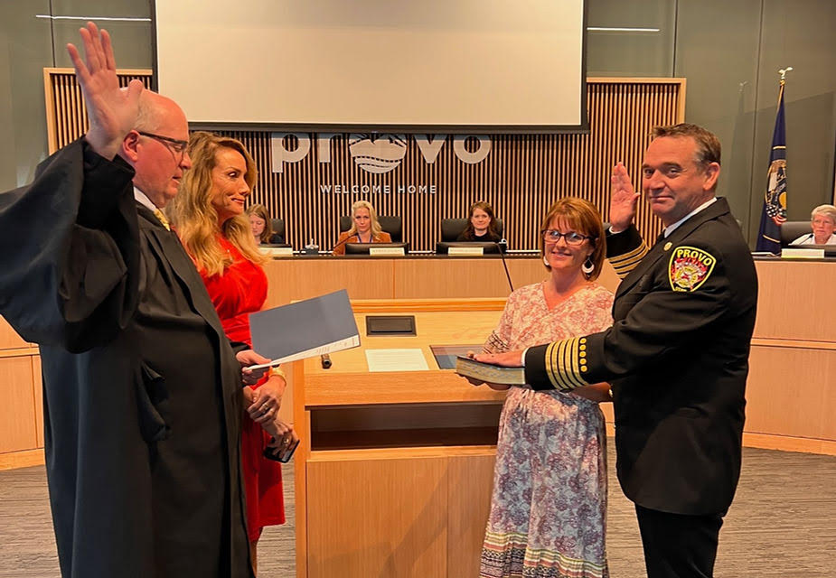 Provo city officials swore in interim fire chief Jeremy Headman, right, as the city's official new fire chief on Tuesday.