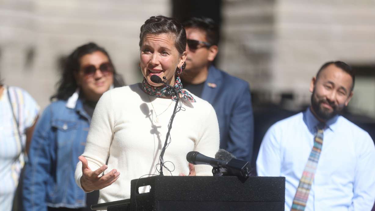 Salt Lake City Mayor Erin Mendenhall speaks in Salt Lake City on June 1, 2022, with some members of the city council behind her. All seven of council members endorsed Mendenhall on Thursday.