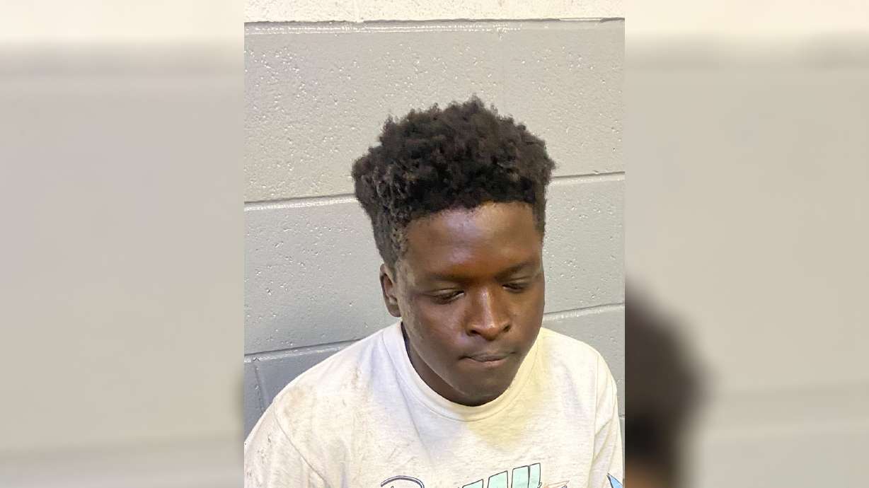 Yessa Harun Nena, 20, of Midvale, was arrested Wednesday after being charged in connection with a gang-related shootout in November that let one man dead and another injured.