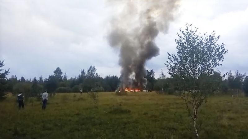 Video, smoke and flames rise from a crashed private jet near the village of Kuzhenkino, Tver region, Russia, Wednesday.