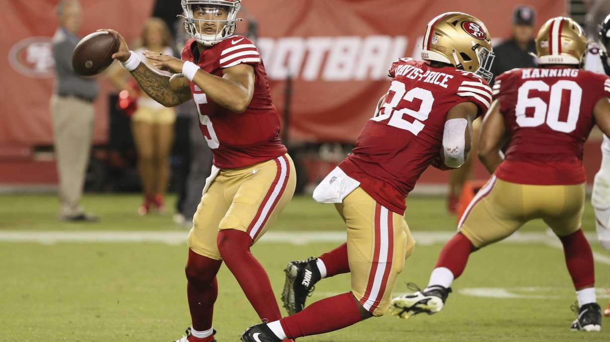 San Francisco 49ers quarterback Trey Lance (5) looks for a receiver during the second half of the team's NFL football preseason game against the Denver Broncos on Saturday, Aug. 19, 2023, in Santa Clara, Calif. The 49ers won 21-20.