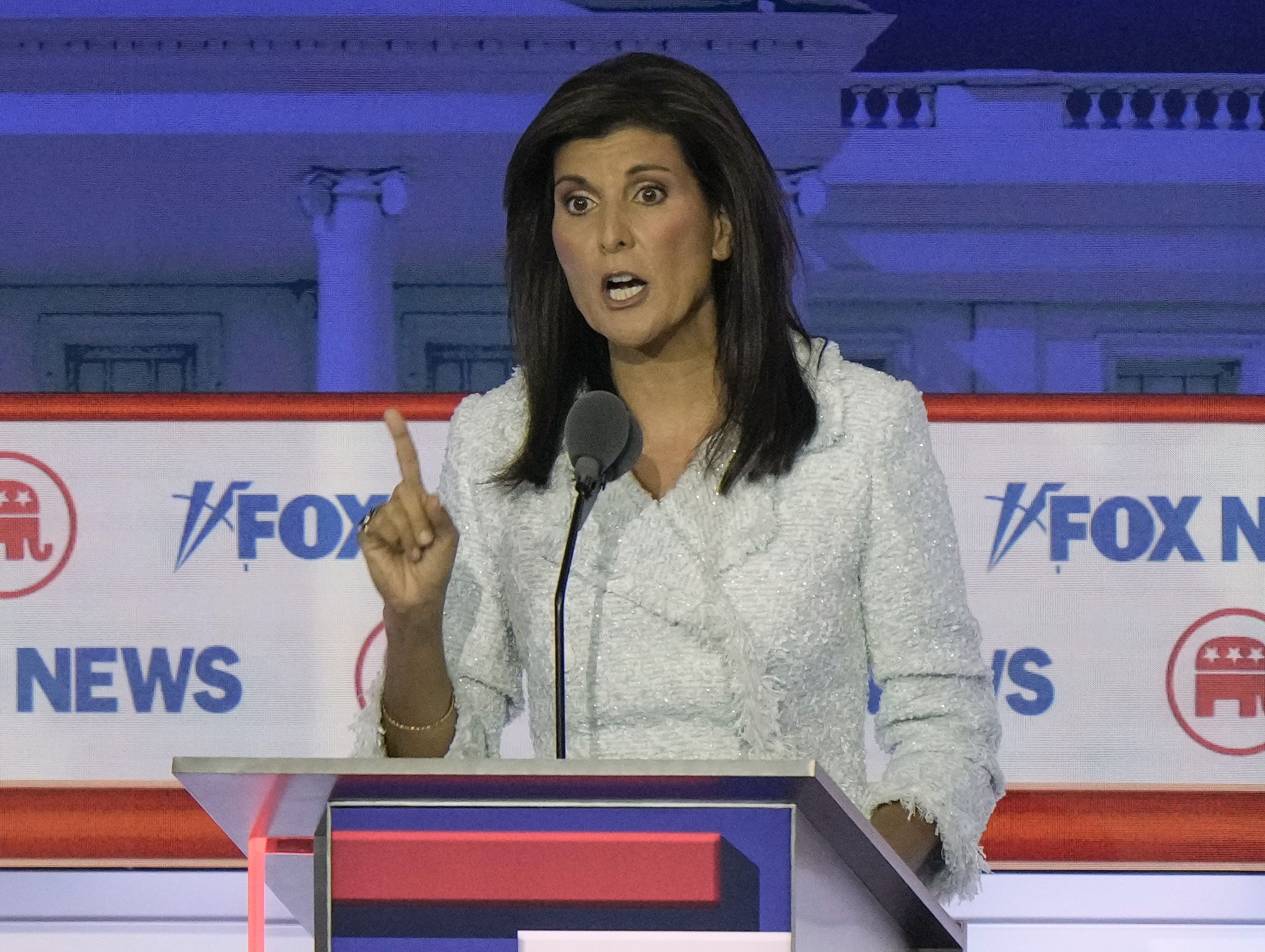 Former U.N. Ambassador Nikki Haley speaks during a Republican presidential primary debate hosted by Fox News Channel on Wednesday in Milwaukee. GOP governor says Nikki Haley stood out in presidential debate.