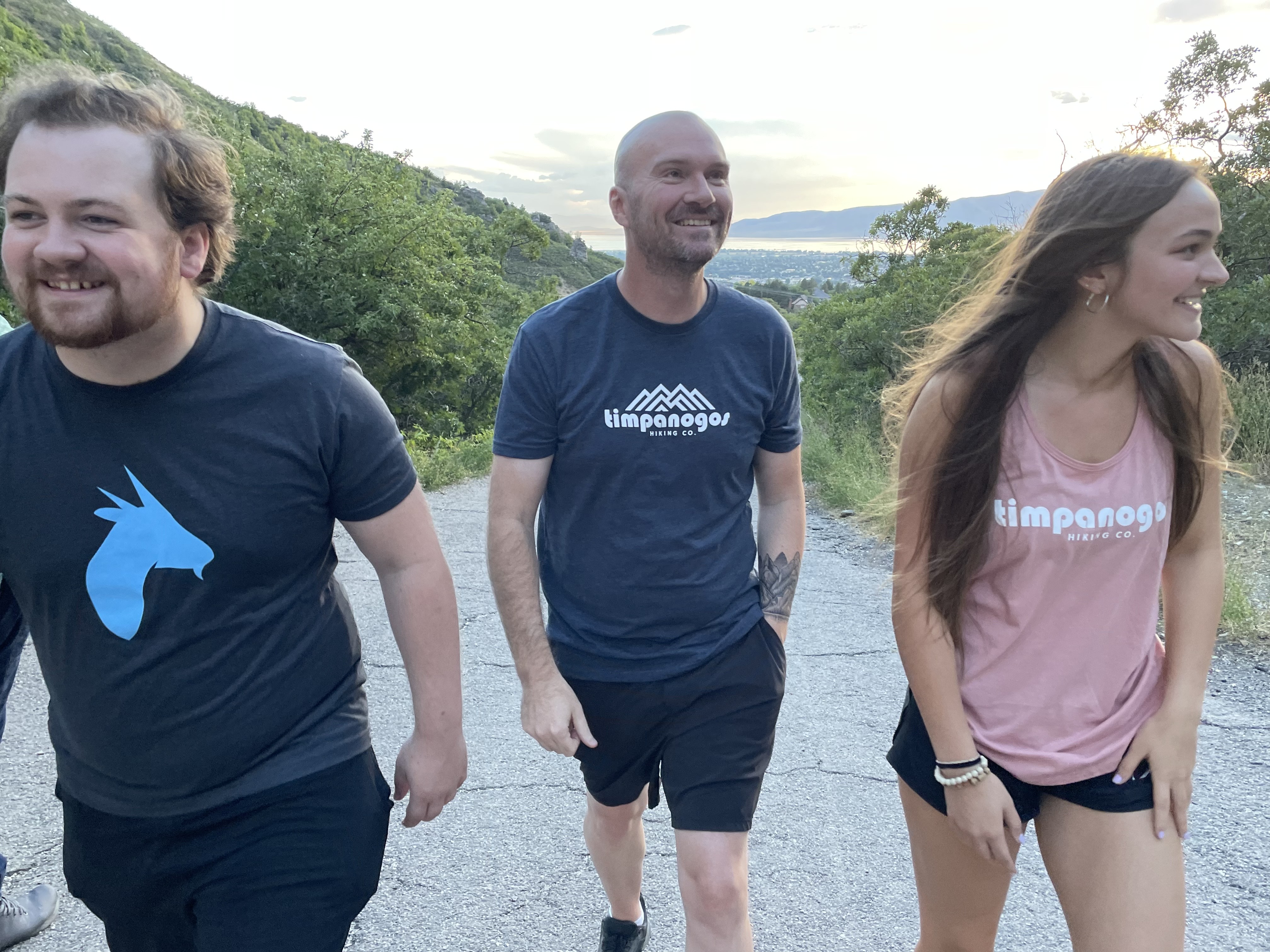 Joe Vogel, center, founded Timpanogos Hiking Co. as a way to promote the importance of hiking and going out into nature. He is reviving a tradition of giving out badges to people who summit Mount Timpanogos.