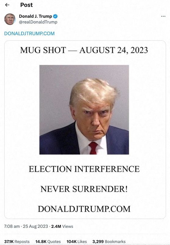 A post by former U.S. President Donald Trump of his police booking mugshot, after a Grand Jury brought back indictments against him and 18 of his allies in their attempt to overturn Georgia's 2020 election results, Aug. 24, is seen in this screenshot.