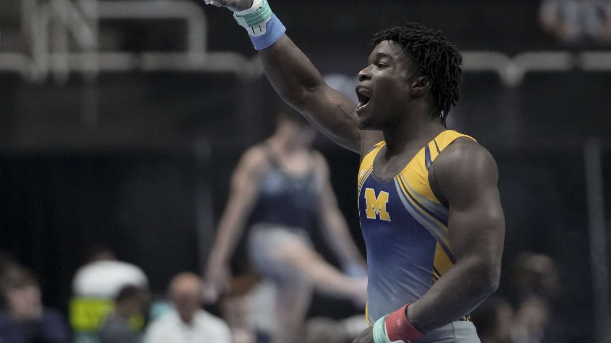 FILE - Fred Richard reacts after competing on the horizontal bar during the U.S. Gymnastics Championships, Thursday, Aug. 24, 2023, in San Jose, Calif. Richard is part of a U.S. men's national team trying to return to relevance. The Americans haven't won a medal at a major international competition in nearly a decade.