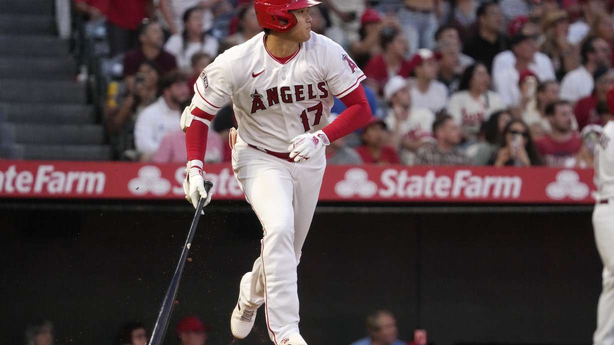 Los Angeles Angels' Shohei Ohtani heads to first during the as he lines out during the second inning in the second baseball game of a doubleheader against the Cincinnati Reds Wednesday, Aug. 23, 2023, in Anaheim, Calif.