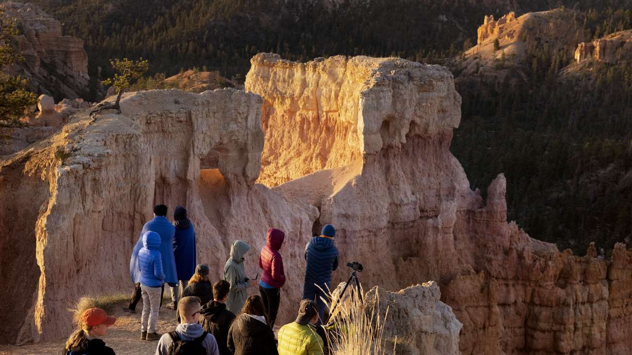 People visit Bryce Canyon National Park on May 18. A new report finds visitation to Utah's national parks generated $2.6 billion in economic output, putting the state near the top in the U.S.