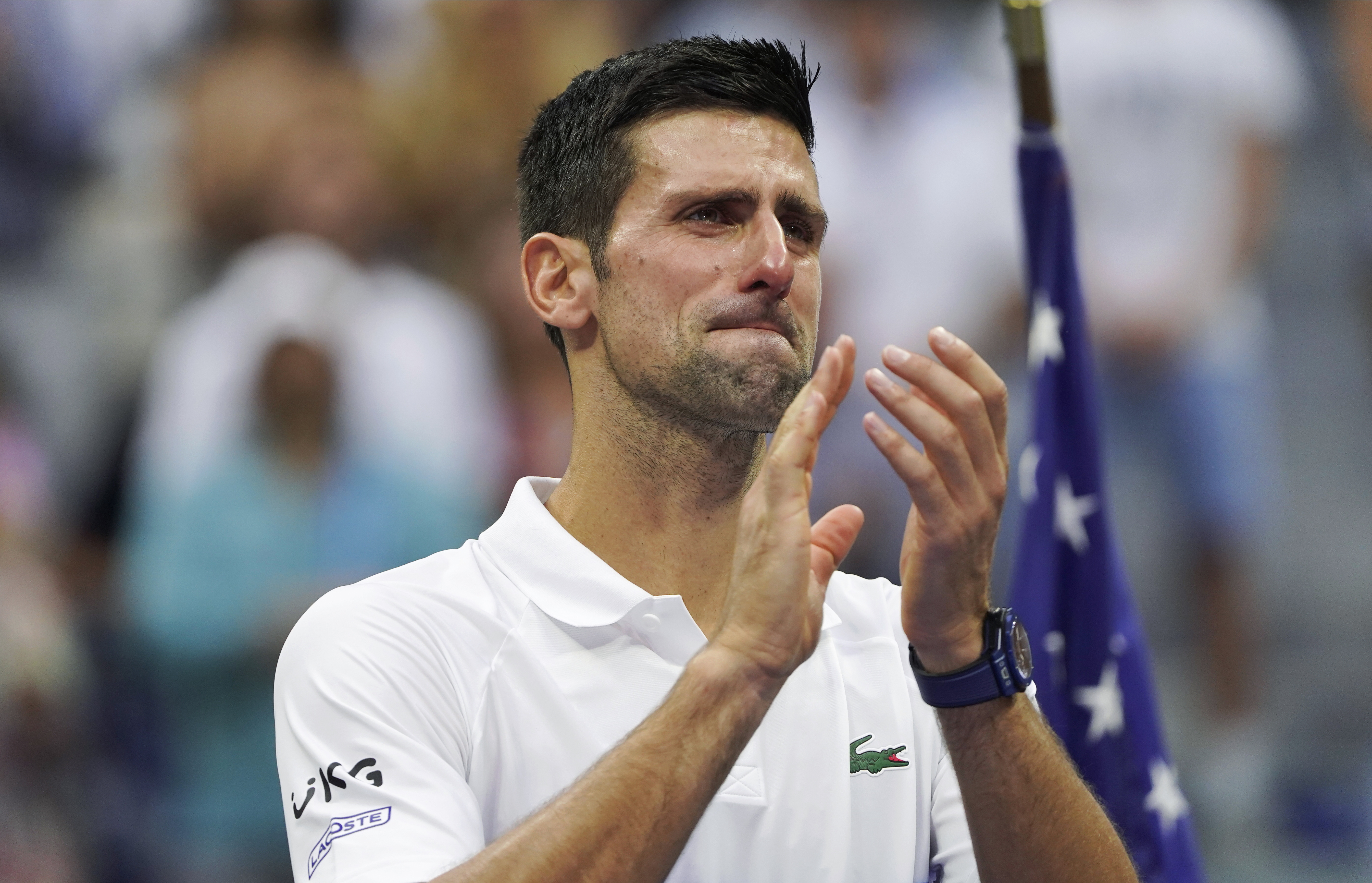 FILE - Novak Djokovic, of Serbia, reacts to the crowd after losing to Daniil Medvedev, of Russia, in the men's singles final of the US Open tennis championships Sept. 12, 2021, in New York. The match was Djokovic's most recent one in New York. He missed 2022's U.S. Open because he was not vaccinated against COVID-19. 