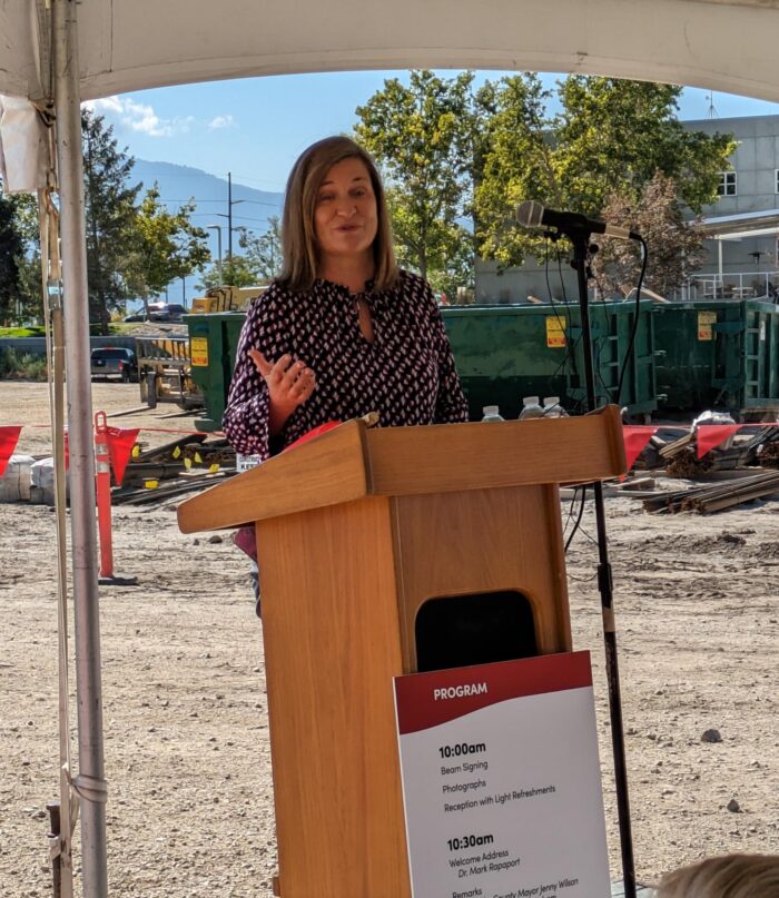 Salt Lake County Mayor Jenny Wilson speaks at the construction site of the new Crisis Care Center in South Salt Lake.