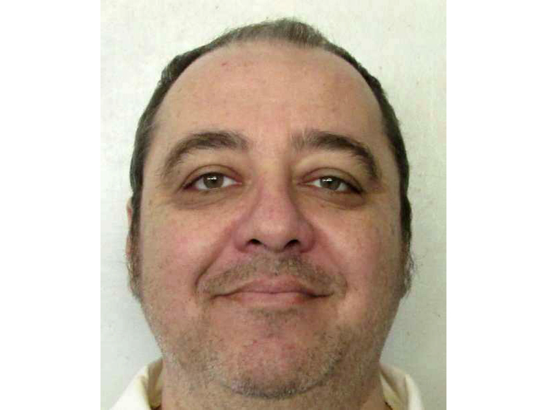 This undated photo provided by Alabama Department of Corrections shows inmate Kenneth Eugene Smith, who was convicted in a 1988 murder-for-hire slaying of a preacher's wife. The Alabama attorney general’s office on Friday asked the state Supreme Court to set an execution date for death row inmate Kenneth Smith. Alabama plans to put him to death by nitrogen hypoxia, an execution method that is authorized in three states but has never been used.