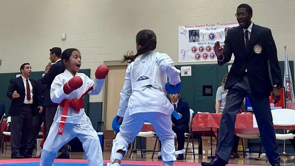 Two girls spar during the seventh annual Seleny Joanne Karate Championship in Lehi on Saturday. David and Seleny Crosby started the tournament to honor their late daughter, Seleny Joanne, who died in a bus accident at age 10.