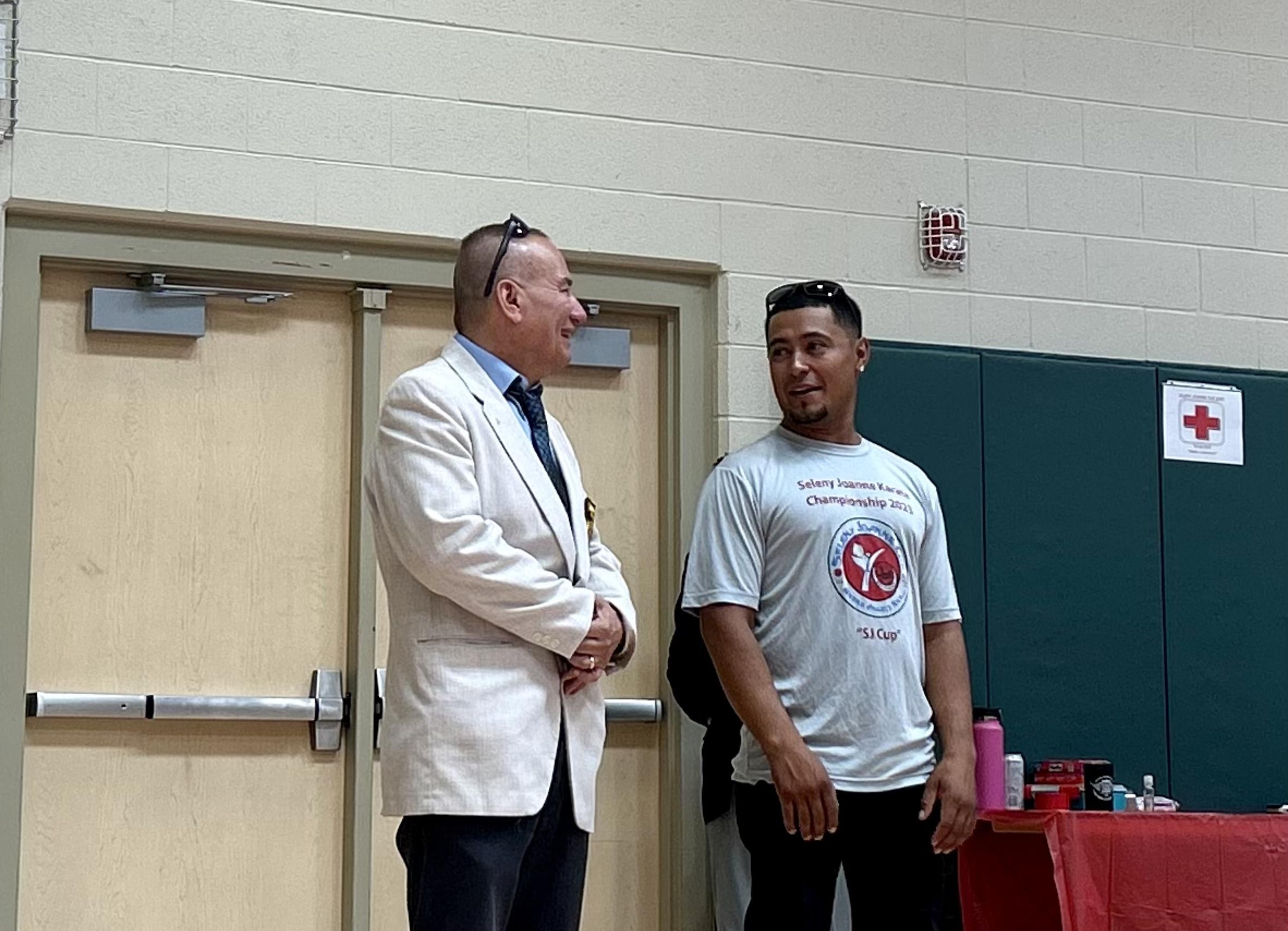 David Crosby, left, smiles during the seventh annual Seleny Joanne Karate Championship in Lehi on Saturday. David and Seleny Crosby started the tournament to honor their late daughter, Seleny Joanne, who died in a bus accident at age 10.
