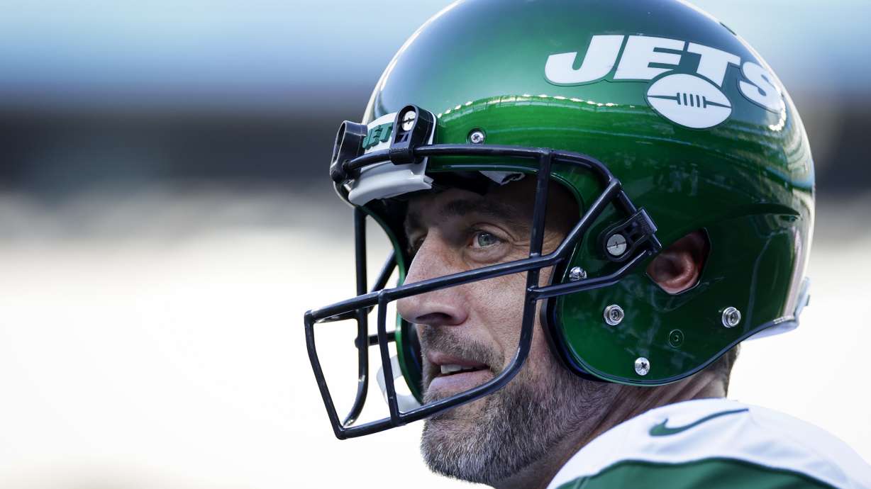 New York Jets quarterback Aaron Rodgers practices before an NFL preseason football game against the New York Giants, Saturday, Aug. 26, 2023, in East Rutherford, N.J.