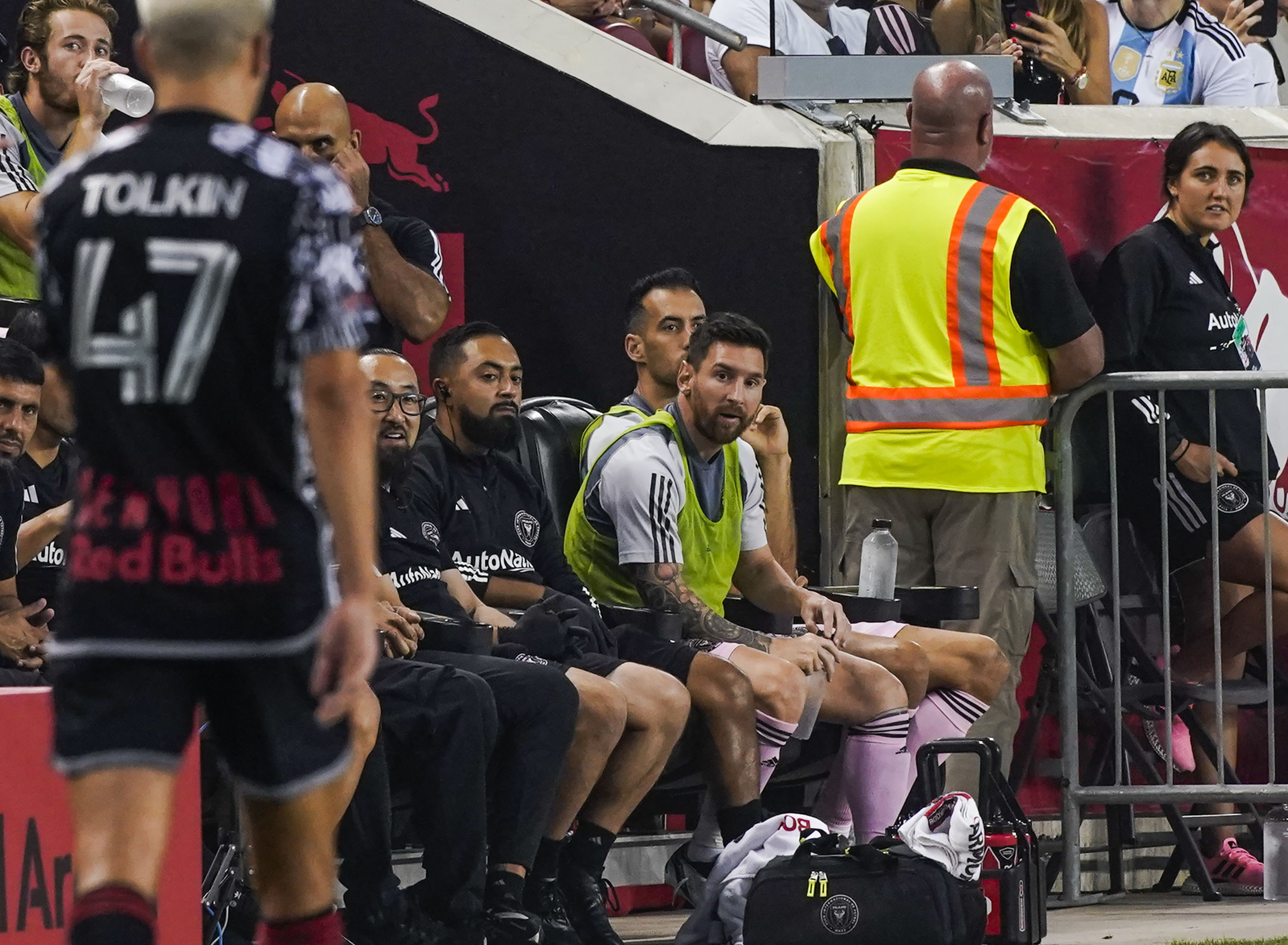 Inter Miami forward Lionel Messi, center right, watches from the bench during an MLS soccer match against the New York Red Bulls at Red Bull Arena, Saturday, Aug. 26, 2023, in Harrison, N.J.