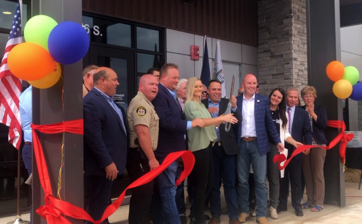 Left to right: Utah Rep. Walt Brooks, Washington County Sheriff Nate Brooksby, Washington County Commissioner Adam Snow, Washington County Administrator Nicholle Felshaw, Washington County Commissioner Victor Iverson, Utah Gov. Spencer Cox and other dignitaries cut a ceremonial ribbon to open the Washington County Crisis Stabilization Center, Hurricane on Tuesday.