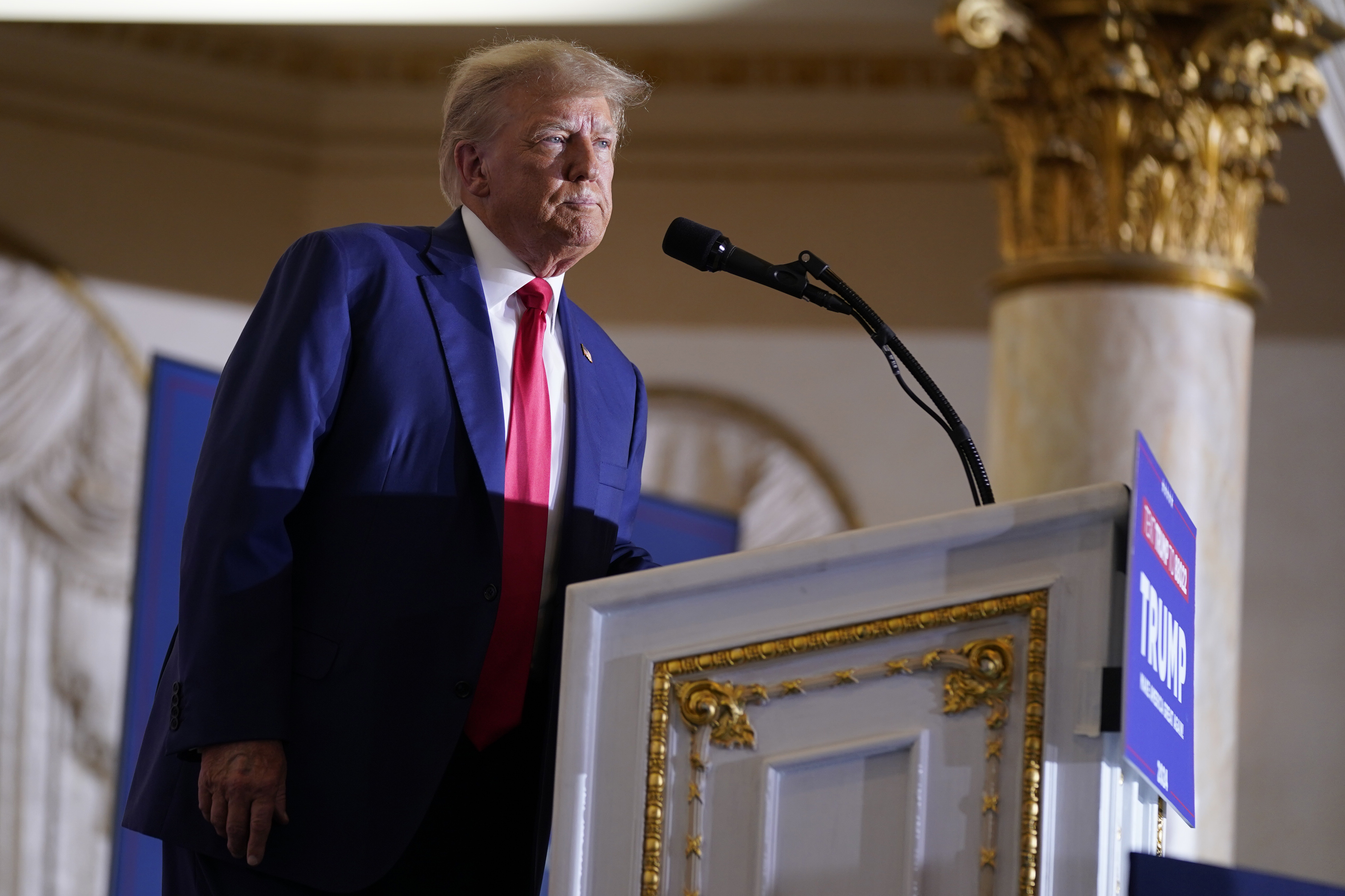 Former President Donald Trump speaks at his Mar-a-Lago estate on April 4. Lawyers for Trump went back to court Monday, as a judge considers proposals for a trial date in the case accusing him of working to overturn the results of the 2020 election. 