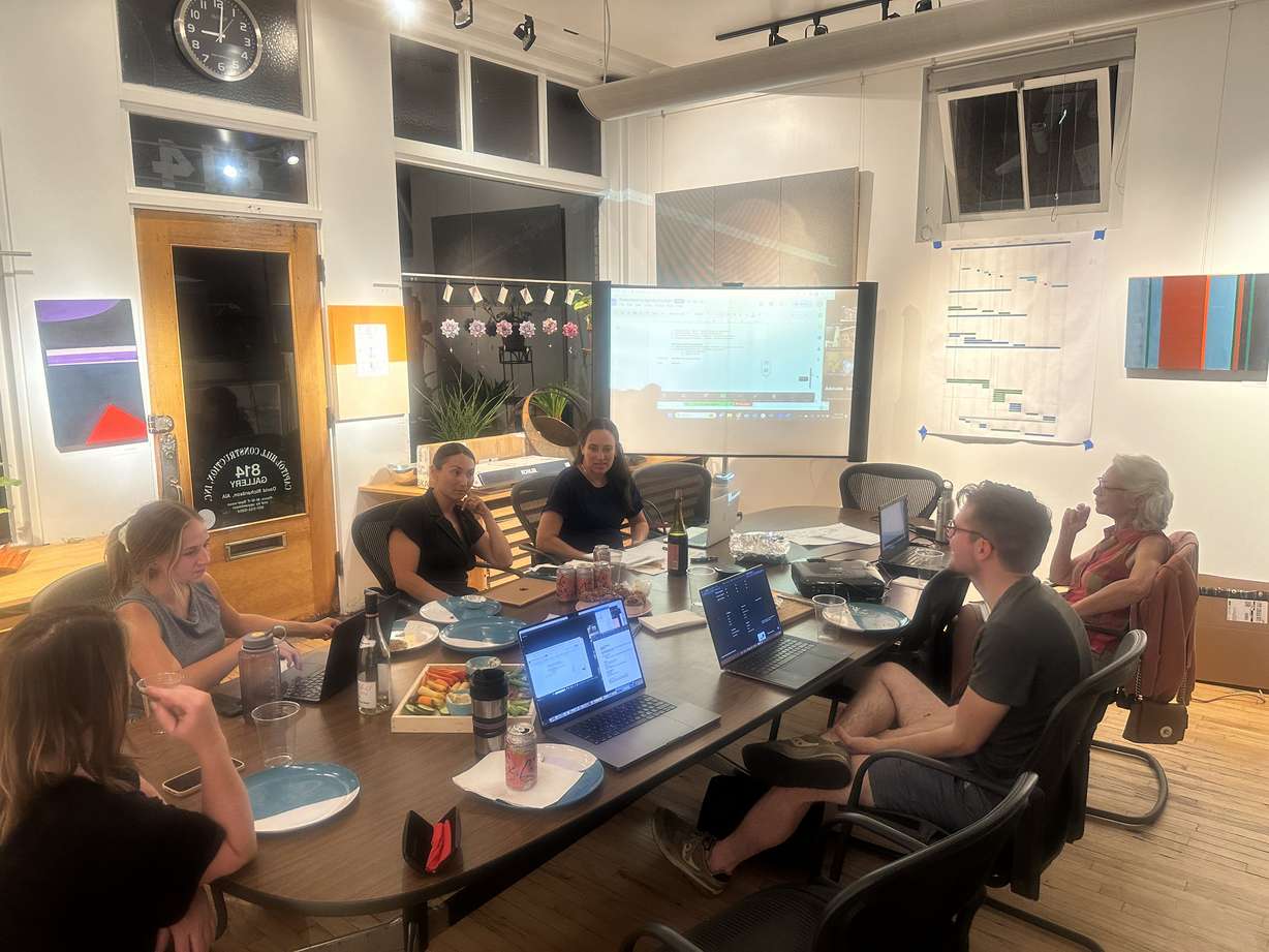 Member-owners of the Wasatch Cooperative Market strategize during a board of directors meeting. The co-op's latest challenge is a pivotal one and one that could catapult the market from a relatively small, grassroots effort into a true market with a full-fledged storefront open to members and public, alike.