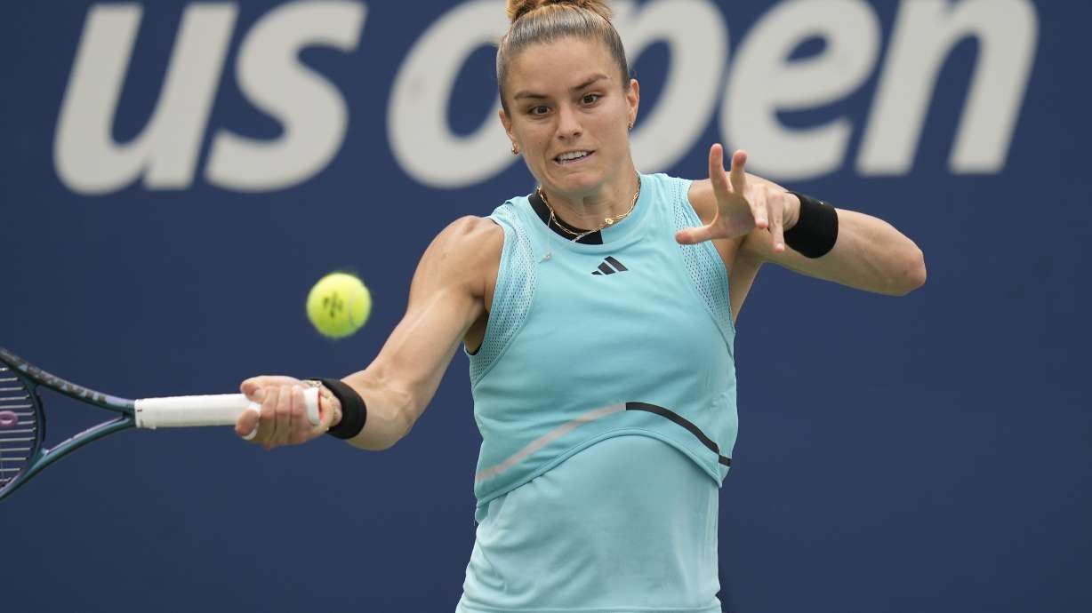 Maria Sakkari, of Greece, returns a shot to Rebeka Masarova, of Spain, during the first round of the U.S. Open tennis championships, Monday, Aug. 28, 2023, in New York.