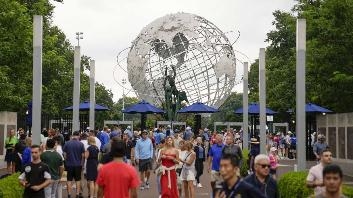 Tennis fans arrive at the Billie Jean King National Tennis Center for the first round of the U.S. Open tennis championships, Monday, Aug. 28, 2023, in New York.