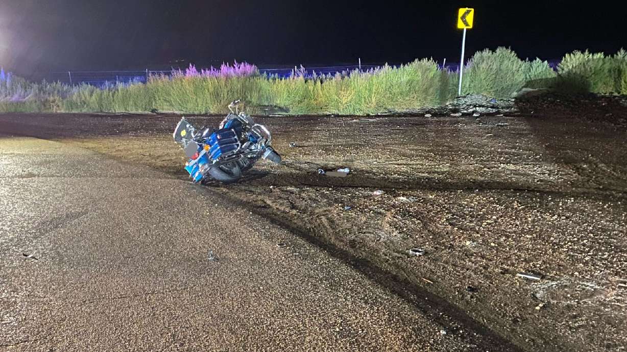 A motorcycle crashed into two parked cars Sunday morning in Weber County, killing the driver and injuring a passenger, Utah Highway Patrol said.