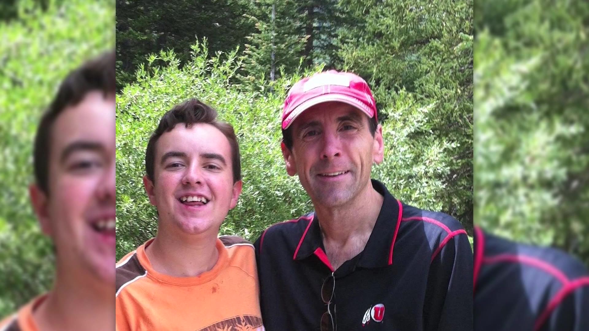 Phil Bailey with one of his sons. Bailey disappeared while snorkeling in Hawaii on Aug. 22.