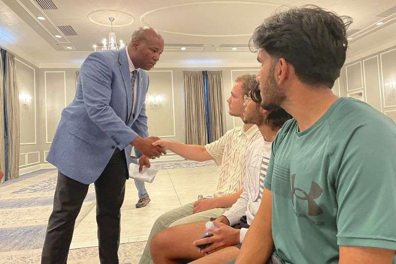 UNC-Chapel Hill Chief of Police Brian James consoles students who had spent hours on lockdown during an active shooter situation on campus, Monday at The Carolina Inn in Chapel Hill, N.C.