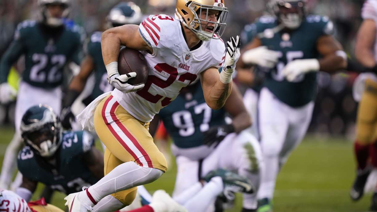 FILE - San Francisco 49ers running back Christian McCaffrey plays during the NFC Championship NFL football game on Sunday, Jan. 29, 2023, in Philadelphia. McCaffrey averaged 114.8 yards from scrimmage per game with 10 TDs in his 10 starts in San Francisco.