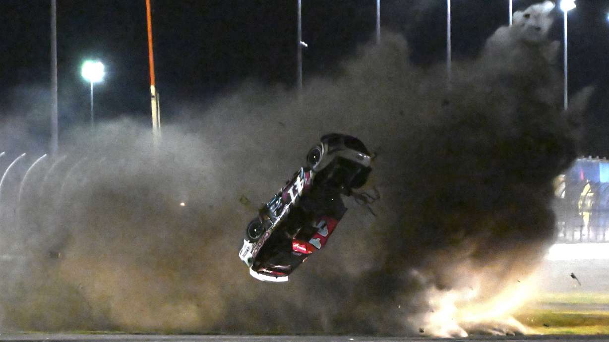 Ryan Preece barrel rolls along the back stretch during the NASCAR Cup Series auto race at Daytona International Speedway, Saturday, Aug. 26, 2023, in Daytona Beach, Fla.