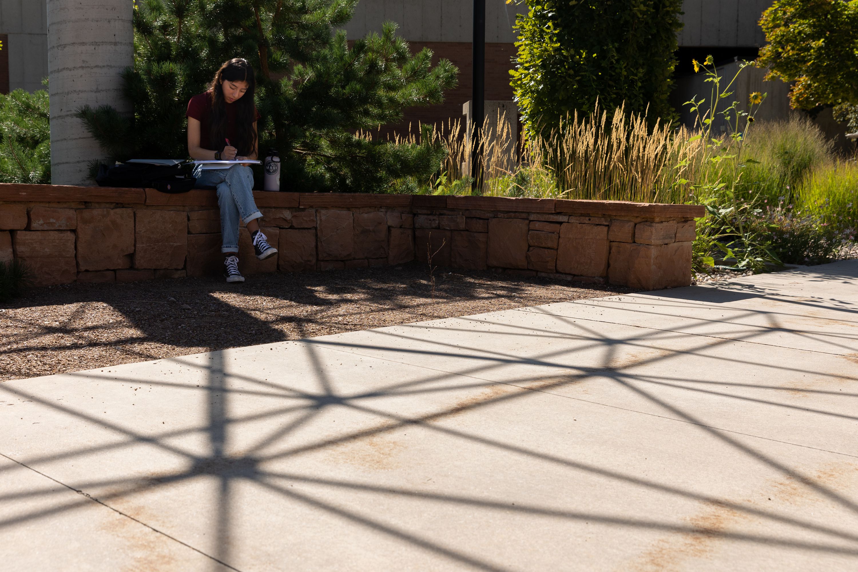 Dayanara Zarate, a freshman from Logan, studies on the University of Utah campus in Salt Lake City on Monday.