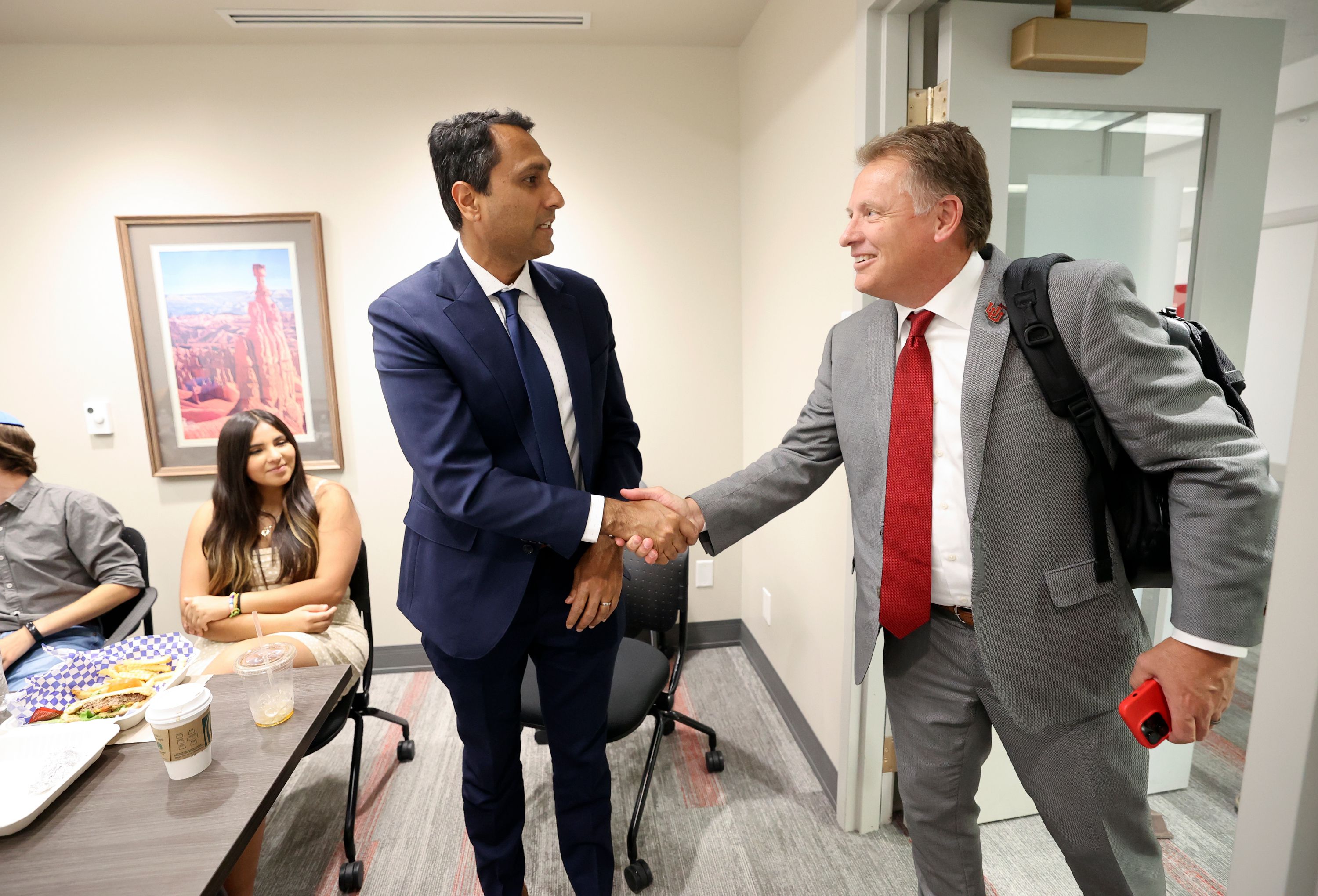 Eboo Patel, impact scholar, meets Taylor Randall, University of Utah president, at the University of Utah in Salt Lake City on Wednesday.