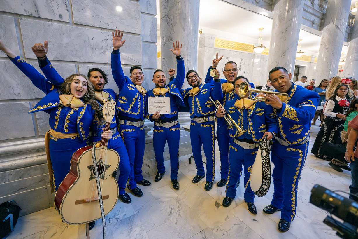 Mariachi Guzmán celebrates their win in Sones de Mariachi en Utah, the state's first mariachi competition, on Wednesday at the state Capitol in Salt Lake City.