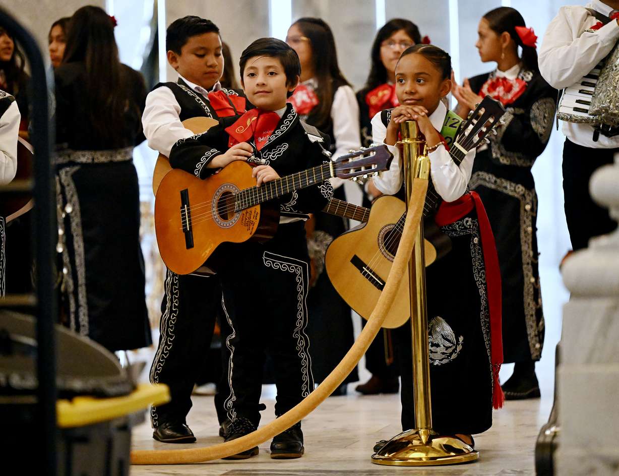 Young mariachi performers watch during Sones de Mariachi en Utah on Wednesday at the state Capitol in Salt Lake City.