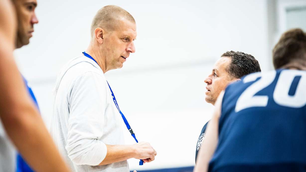 BYU men's basketball coach Mark Pope speaks with his team during practice, Aug. 11, 2023, in the Marriott Center Annex in Provo.