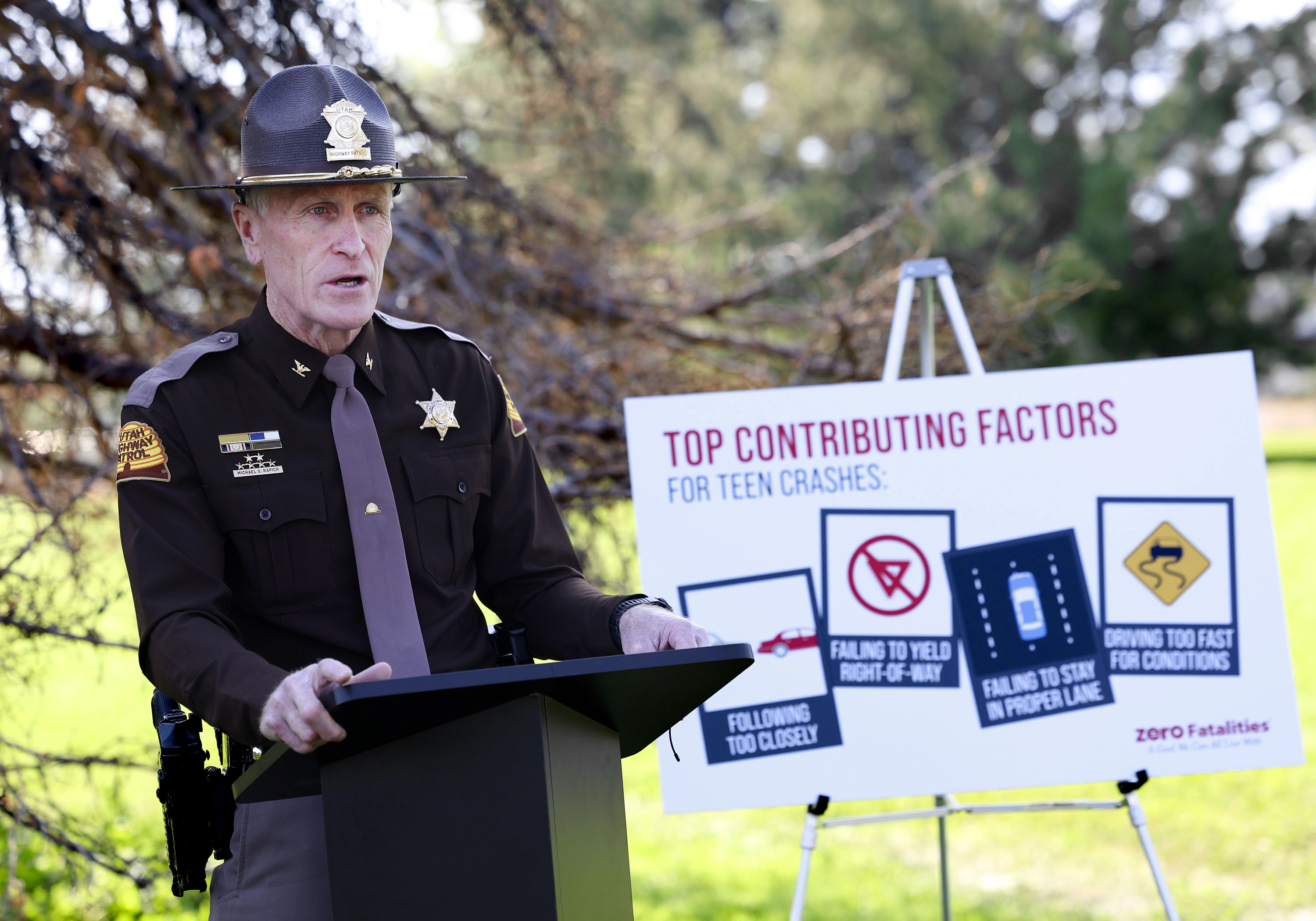 Colonel Michael Rapich, deputy commissioner, Utah Highway Patrol, releases preliminary traffic fatality numbers for the 100 deadliest days of summer 2023 at Sugar House Park Thursday. So far this summer, there have been 82 lives lost compared to the 98 in 2022.