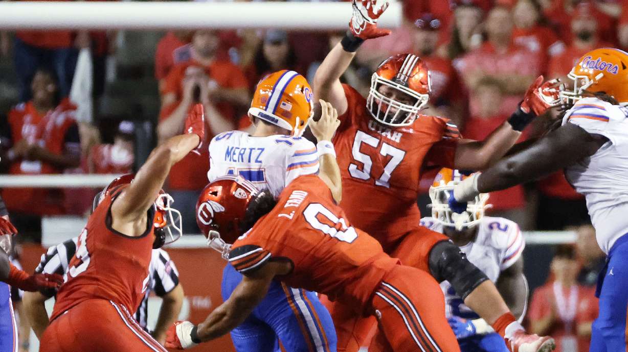 Utah Utes defensive end Logan Fano (0) sacks Florida Gators quarterback Graham Mertz (15) in Salt Lake City on Thursday, Aug. 31, 2023 during the season opener. Utah won 24-11.