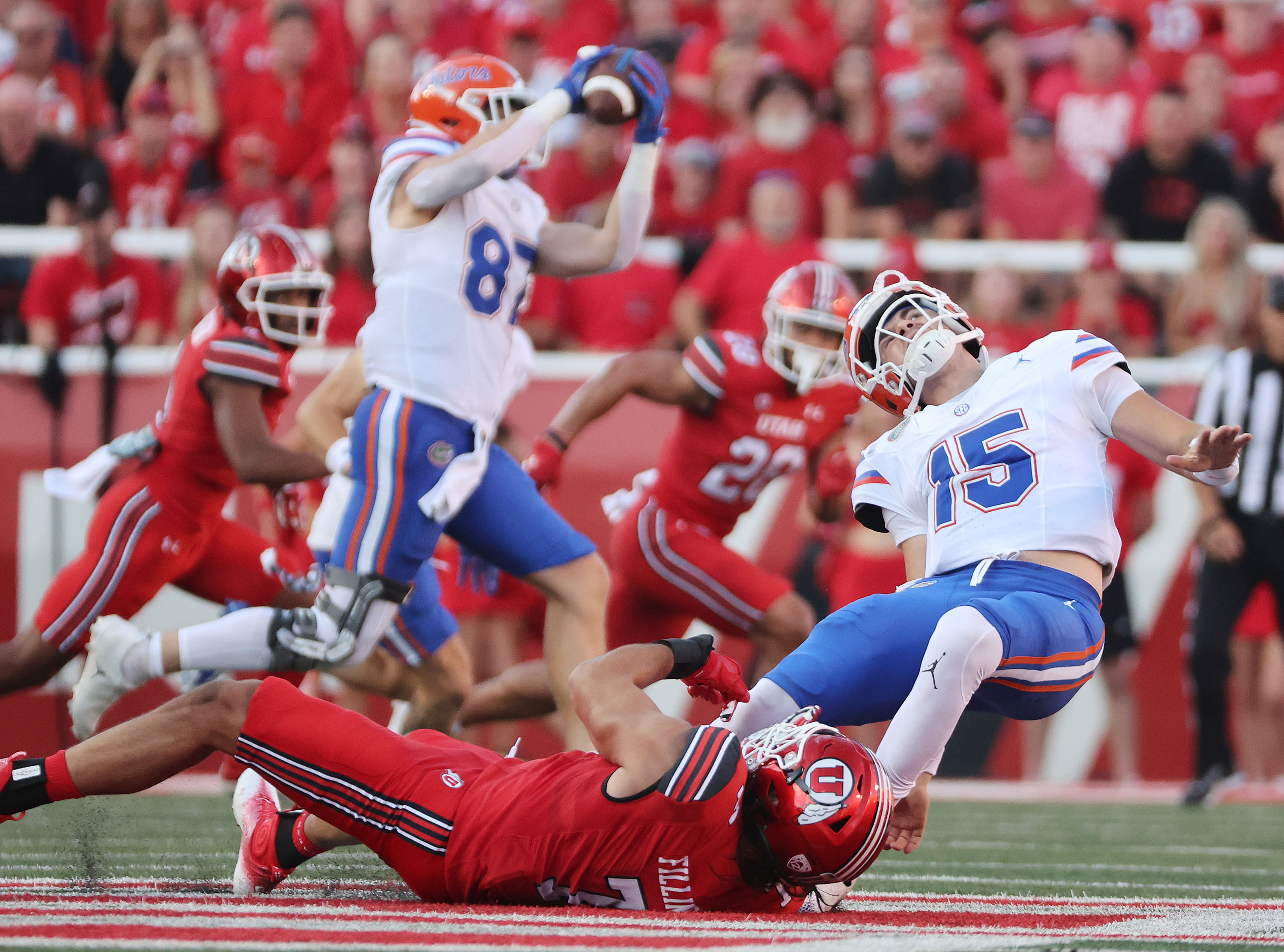 Utah Utes defensive end Van Fillinger (7) hurries Florida Gators quarterback Graham Mertz (15) in Salt Lake City on Thursday, Aug. 31, 2023 during the season opener.