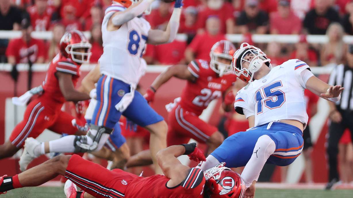 Utah Utes defensive end Van Fillinger (7) hurries Florida Gators quarterback Graham Mertz (15) in Salt Lake City on Thursday, Aug. 31, 2023 during the season opener.
